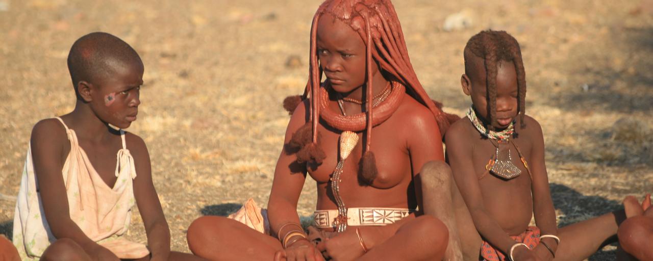 Himba girl and boys at the village