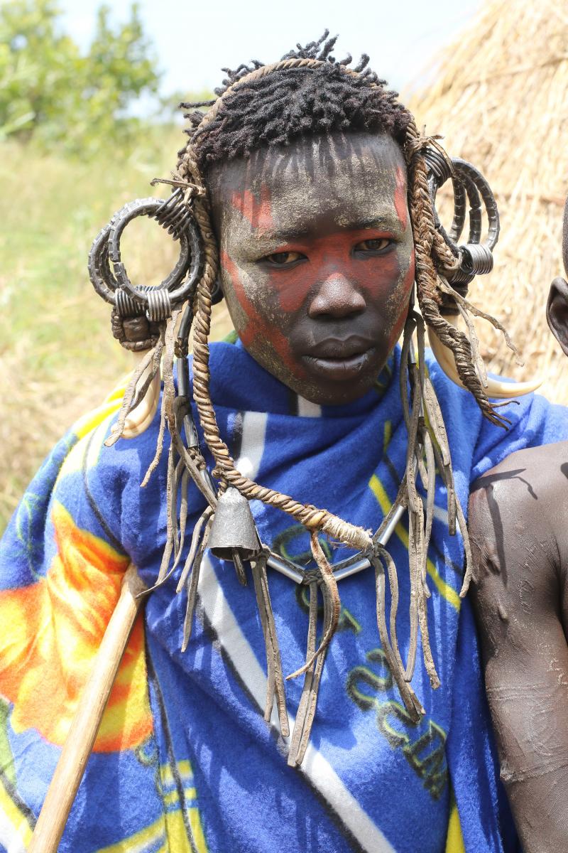 african tribal man painting