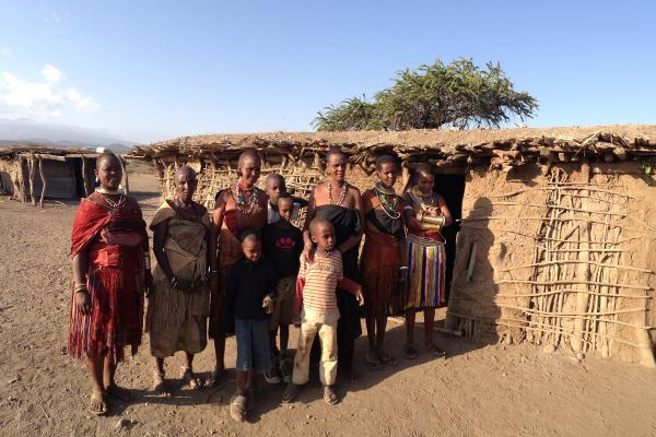 datoga people in front of their huts in tanzania