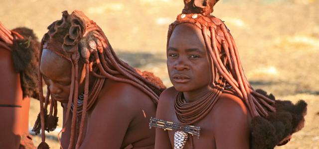 him women with red skin and beautiful hairstyle him namibia