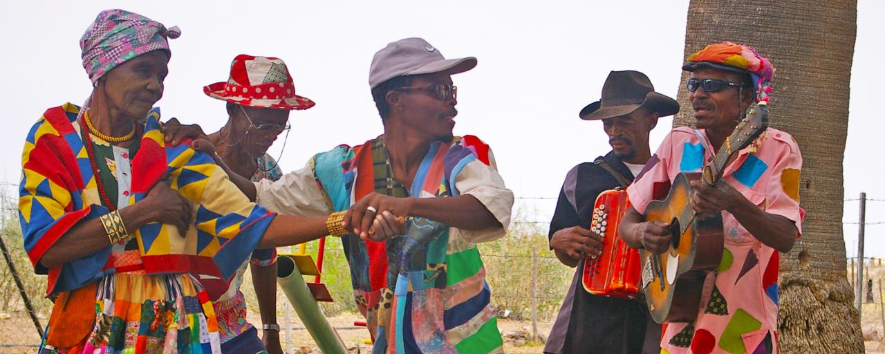 nama people dancing with colorful clothing