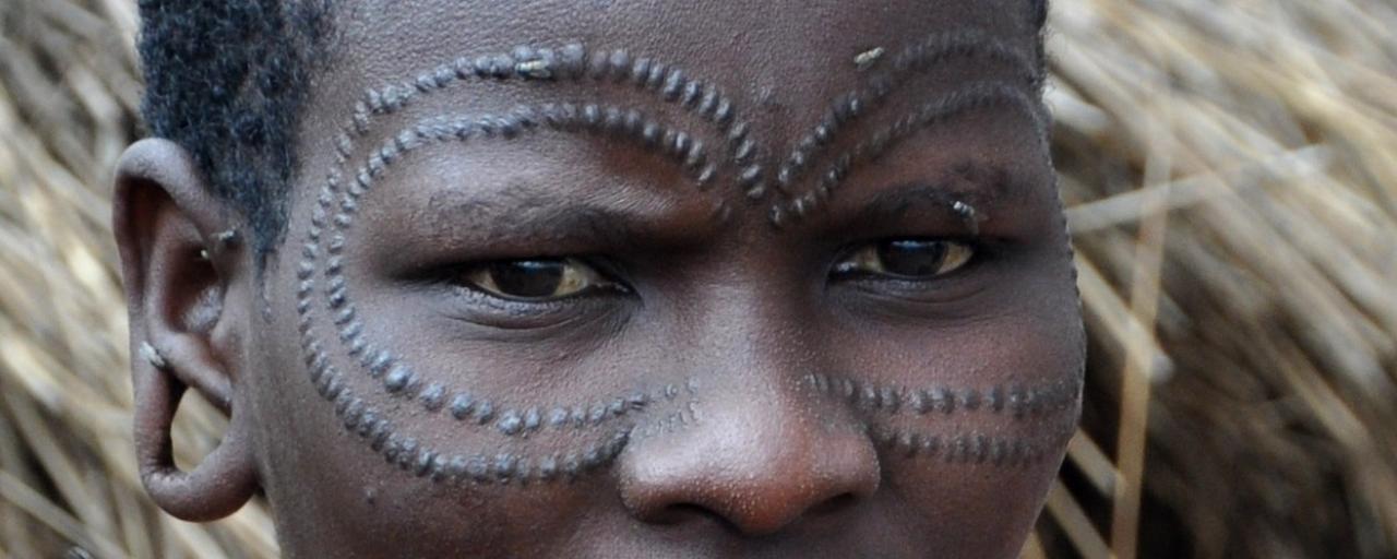 datoga woman with traditional scarification in tanzania