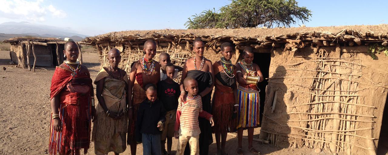 datoga people in front of their huts in tanzania