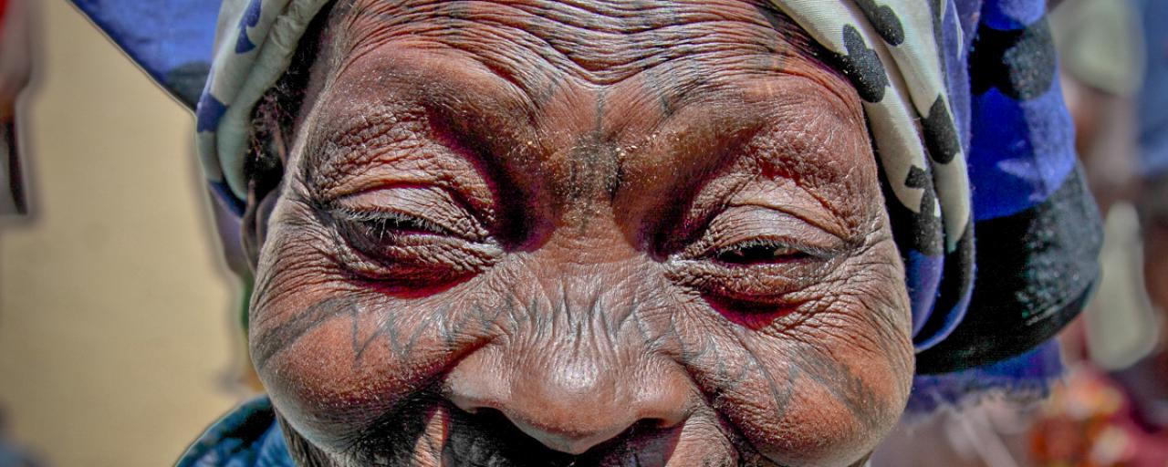 makonde woman with traditional tattoo in tanzania