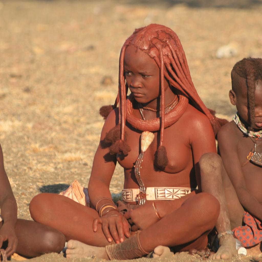 Himba girl and boys at the village